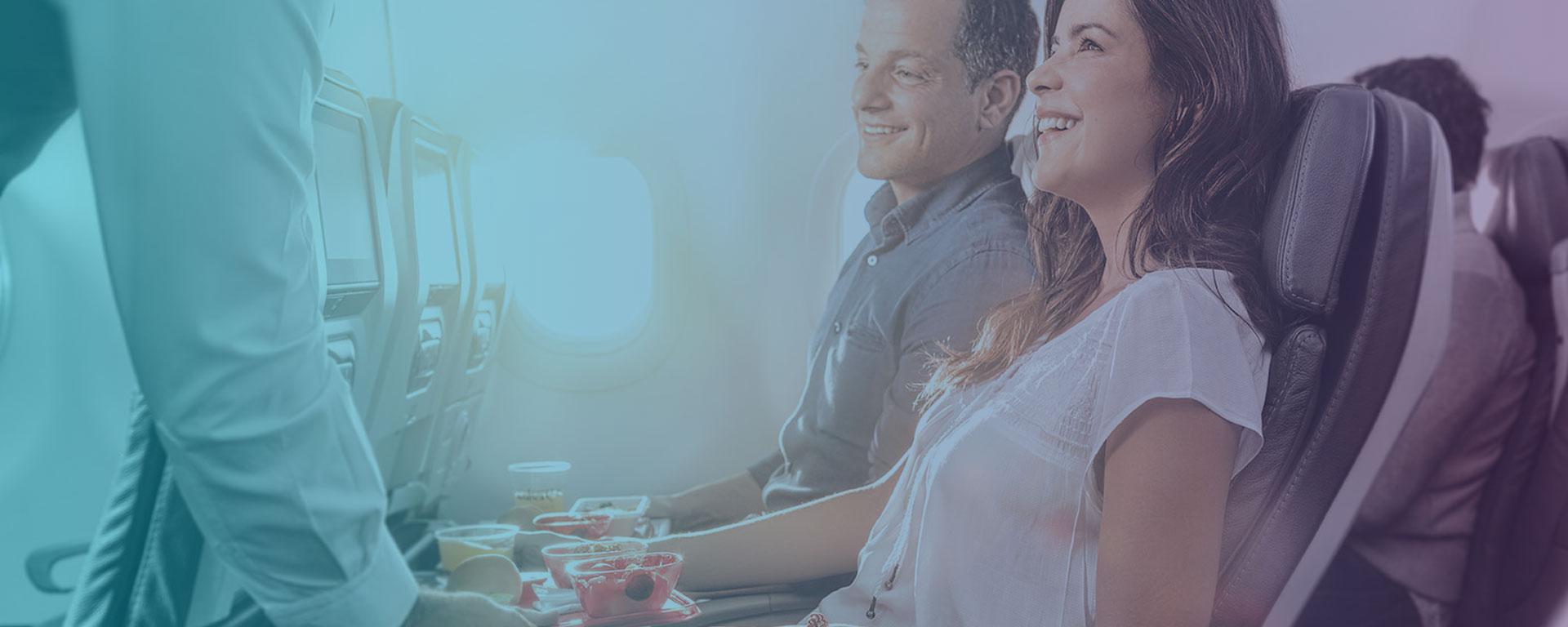 Happy passengers on a plane